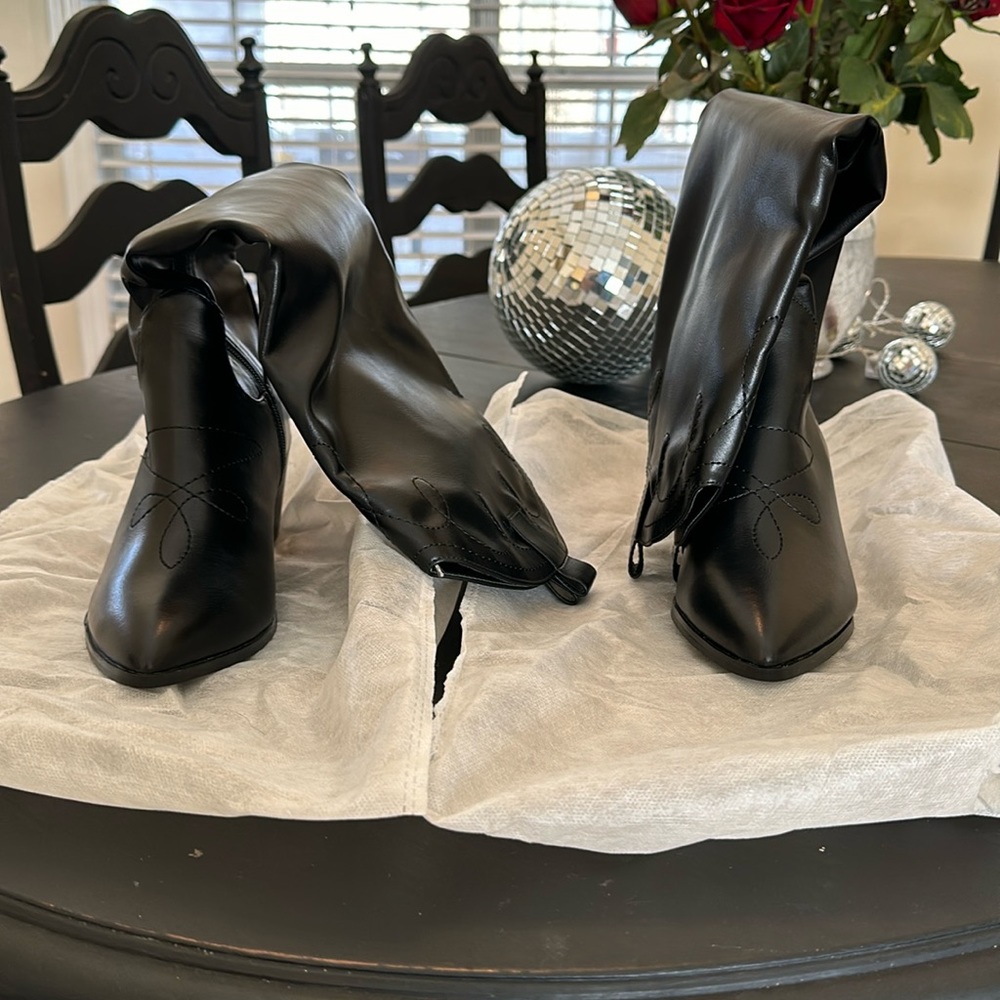 Never worn Black boots